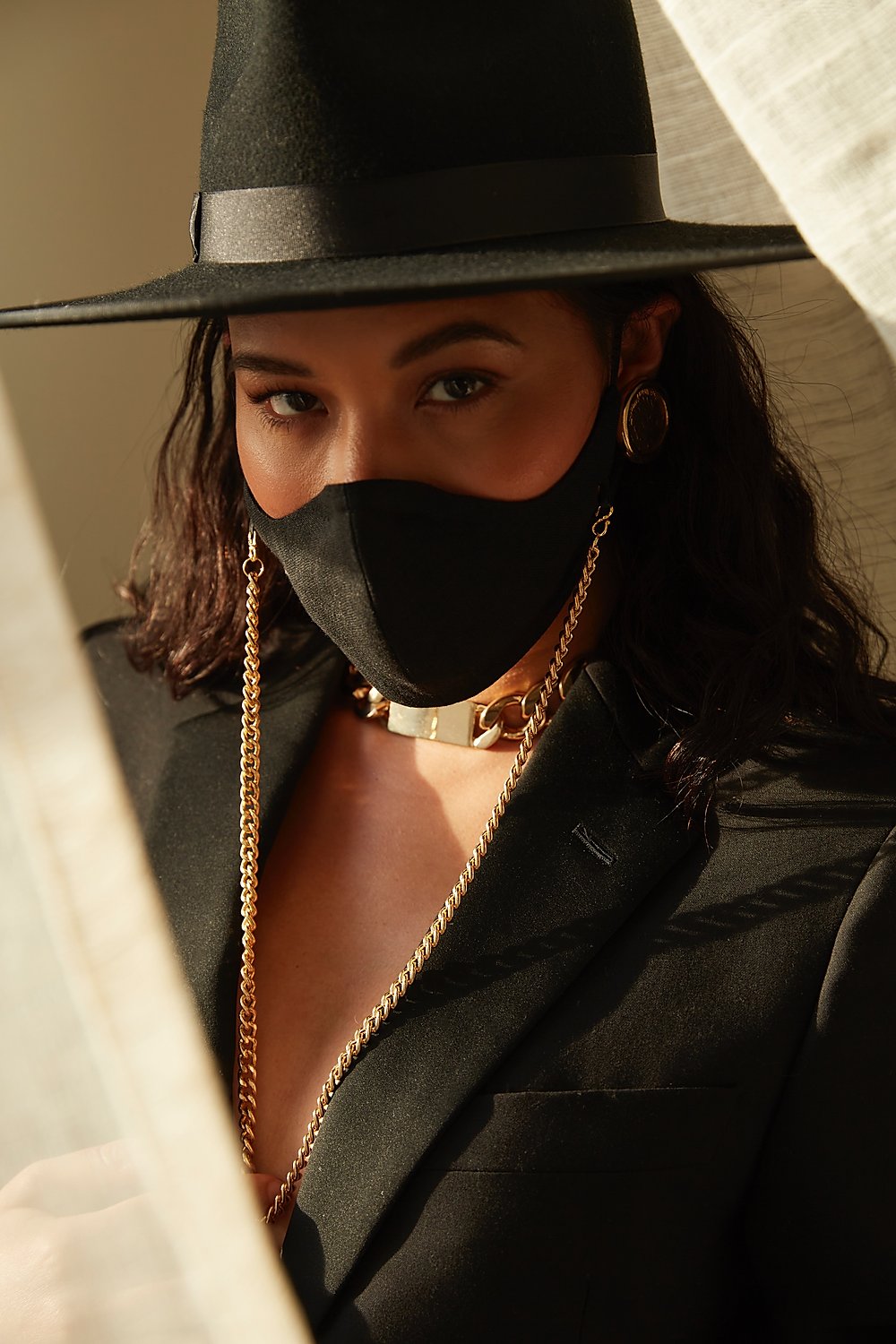 The Classic Tina Mask in Black with Gold Chain.