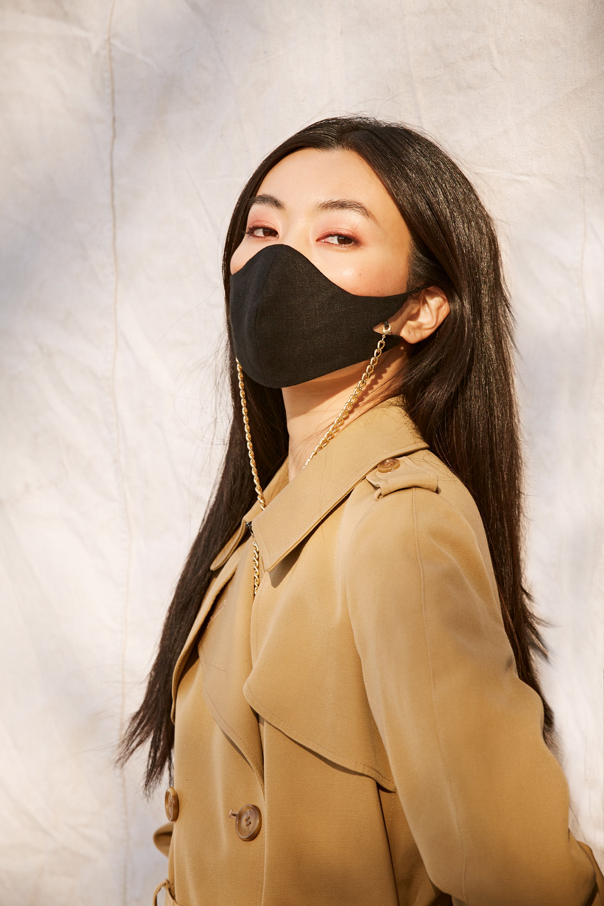 The Classic Tina Mask in Black with Gold Chain.