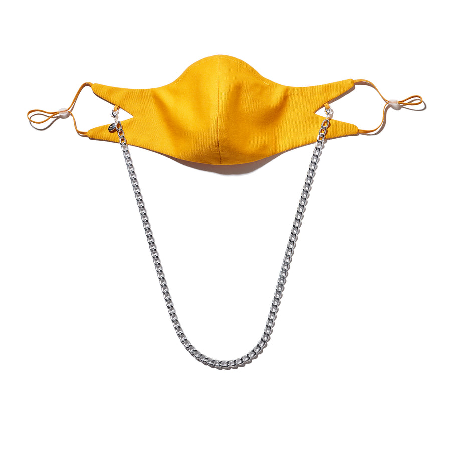 The Tina Cotton Twill in Mustard with 7mm Silver chain.